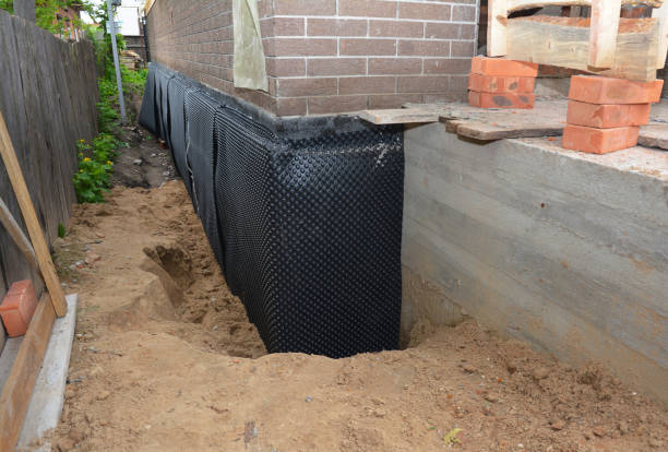 Happy homeowners after waterproofing job in Ogdensburg